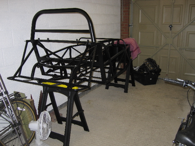 chassis and engine in garage ready for build